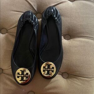 Tory Burch Black Flats with Gold Emblem